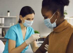 woman getting a vaccine