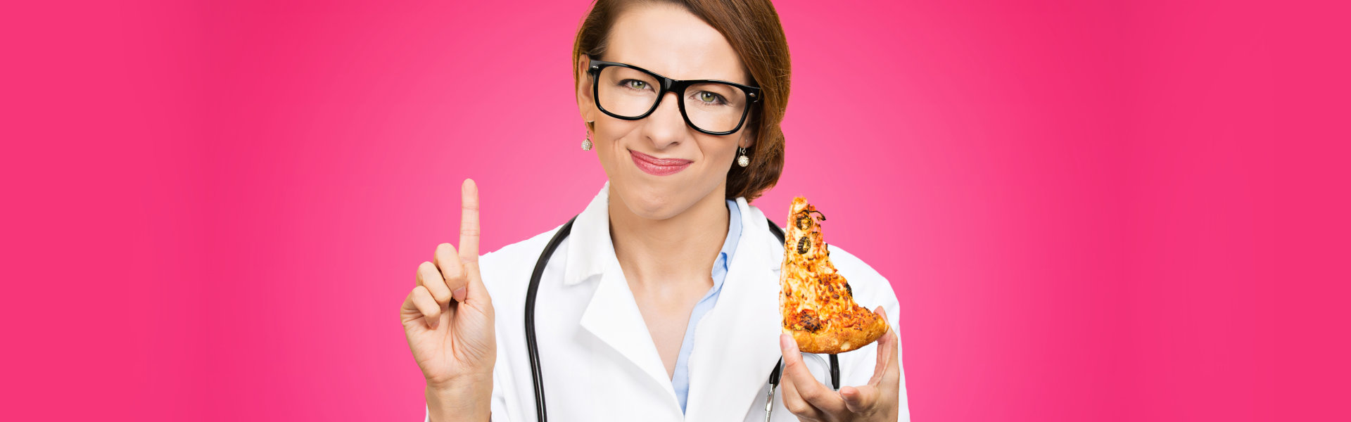 healthcare worker holding a pizza