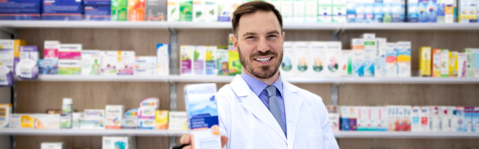 pharmacist holding a vitamins